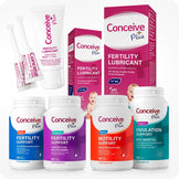 Conceive Plus Maximum Fertility Bundle showing a complete set of fertility products, including men’s and women’s fertility support, motility support, ovulation support, and fertility lubricants with both applicators and boxed packaging, arranged neatly against a white background to highlight product variety and branding.