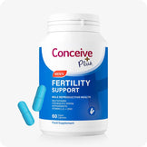 Conceive Plus Men's Fertility Support supplement bottle featuring a bold blue label with white and red accents, displayed with two light blue capsules beside it, photographed on white background to highlight 60 vegan capsule count and key benefits like sperm health and antioxidant support.