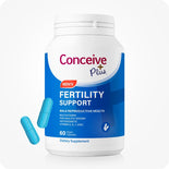 Supplement container labeled 'Conceive Plus' for fertility support on a white background